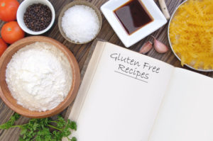Gluten free ingredients including wheat free pasta, soya and other ingredients with a recipe book